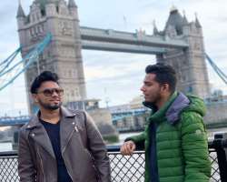 Although he was born in New York but has a Banglad Although he was born in New York but has a Bangladeshi descent due to his parent's background. He also raised funds to renovate a masjid in Bangladesh
